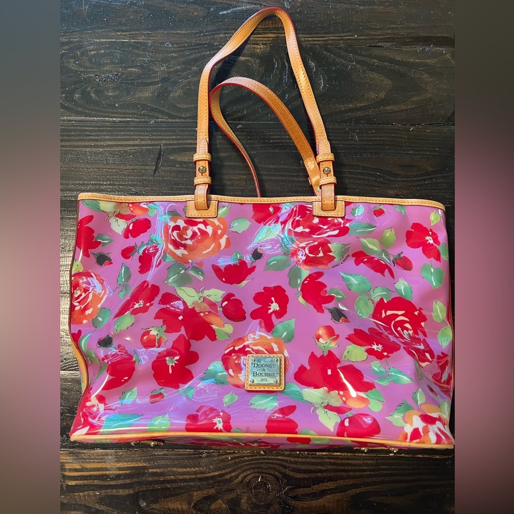 Brand New Beautiful Patent Leather Floral Dooney & Bourke. Never Used.